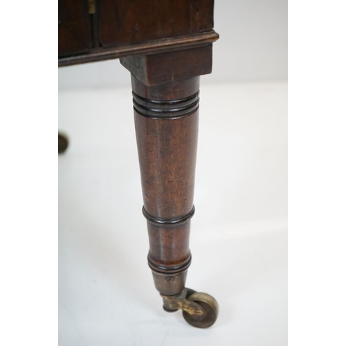 582 - Regency mahogany washstand converted to a work table, on ring turned legs, width approx. 42cm