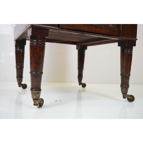 582 - Regency mahogany washstand converted to a work table, on ring turned legs, width approx. 42cm