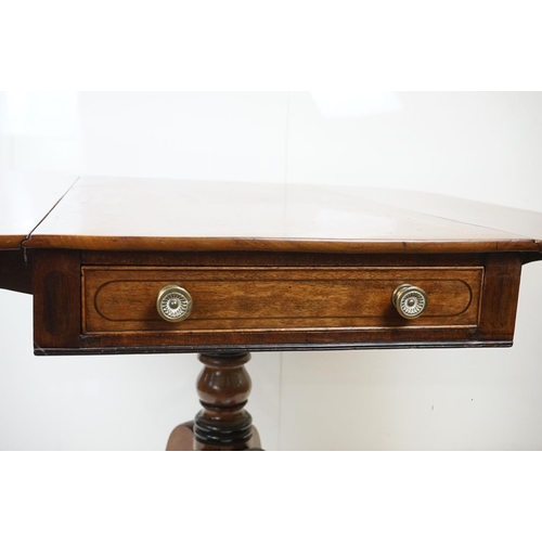 588 - Regency Mahogany Drop Flap Breakfast Table, two drawers to either end,  raised on quadruped swept su... 