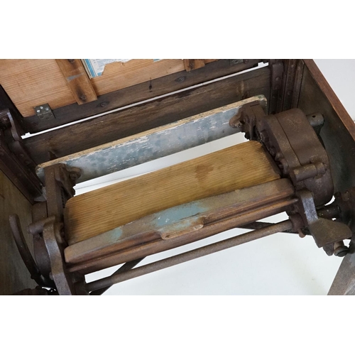 606 - Early 20th century ' Pioneer ' Oak Table and Rubber Wringer, 76cm wide x 52cm deep x 73cm high