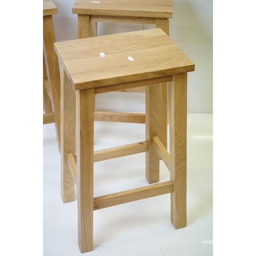 609 - Three Oak Tall Stools with rectangular seats, each 36cm wide x 59cm high