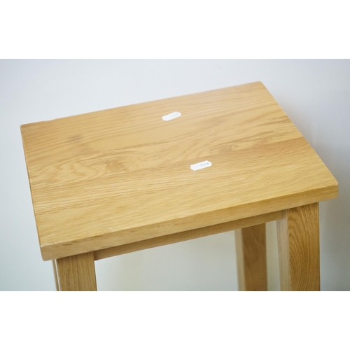 609 - Three Oak Tall Stools with rectangular seats, each 36cm wide x 59cm high