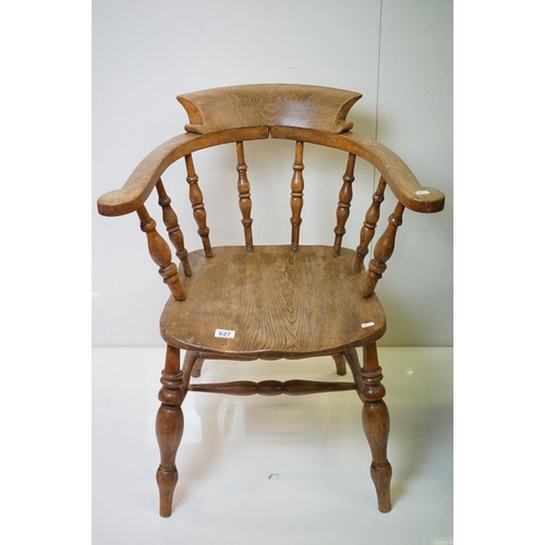 627 - Two similar 19th / Early 20th century Captain's Tub Chairs with elm seats, largest 66cm wide x 79cm ... 