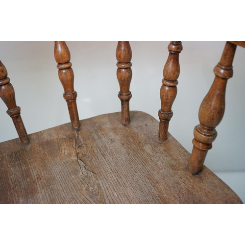 627 - Two similar 19th / Early 20th century Captain's Tub Chairs with elm seats, largest 66cm wide x 79cm ... 