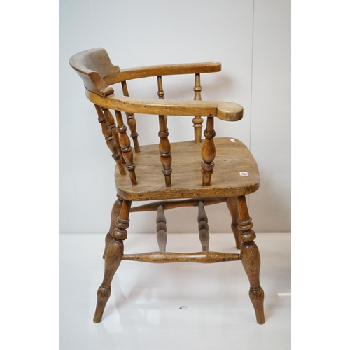 627 - Two similar 19th / Early 20th century Captain's Tub Chairs with elm seats, largest 66cm wide x 79cm ... 