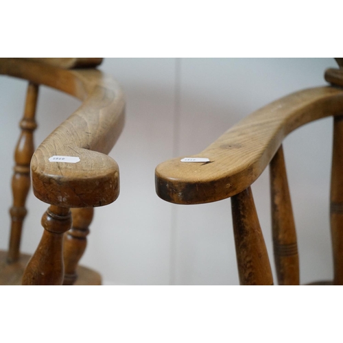 627 - Two similar 19th / Early 20th century Captain's Tub Chairs with elm seats, largest 66cm wide x 79cm ... 