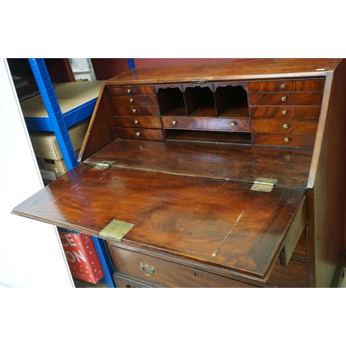 551 - George III Mahogany Bureau, the drop front opening to a fitted interior, over four long drawers, rai... 