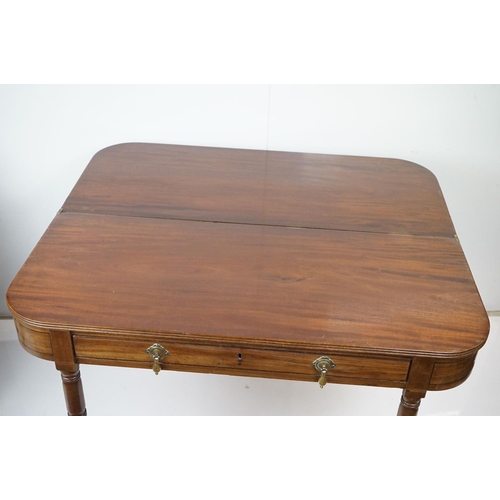 570 - 19th century Mahogany Fold-over Tea Table with single drawer, raised on turned tapering legs, 106cm ... 