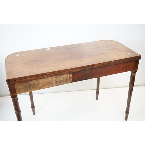 570 - 19th century Mahogany Fold-over Tea Table with single drawer, raised on turned tapering legs, 106cm ... 