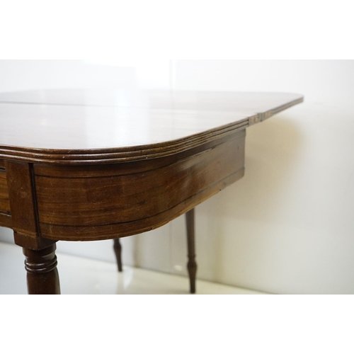 570 - 19th century Mahogany Fold-over Tea Table with single drawer, raised on turned tapering legs, 106cm ... 