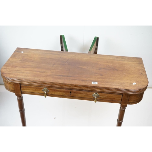 570 - 19th century Mahogany Fold-over Tea Table with single drawer, raised on turned tapering legs, 106cm ... 