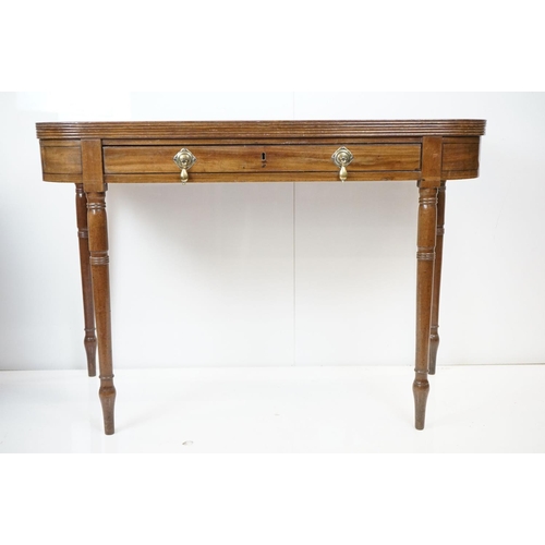 570 - 19th century Mahogany Fold-over Tea Table with single drawer, raised on turned tapering legs, 106cm ... 