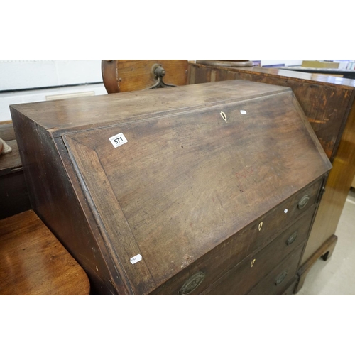 571 - George III Mahogany Bureau, the drop front opening to a fitted interior, over three long drawers, ra... 