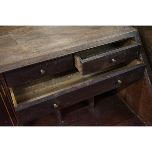 571 - George III Mahogany Bureau, the drop front opening to a fitted interior, over three long drawers, ra... 