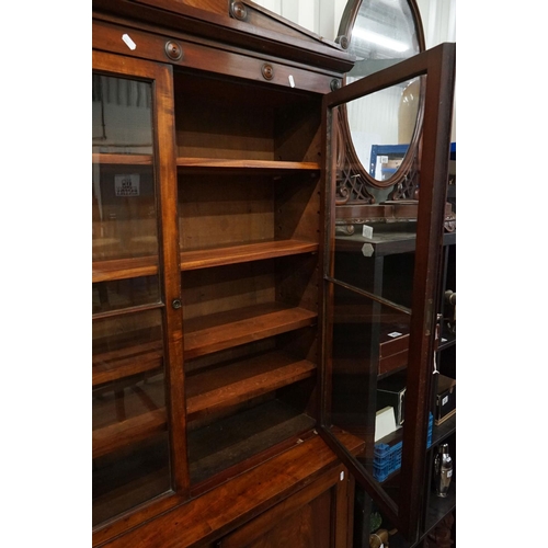 613 - Regency / William IV Mahogany Glazed Bookcase / Cupboard, the upper section with two glazed doors op... 