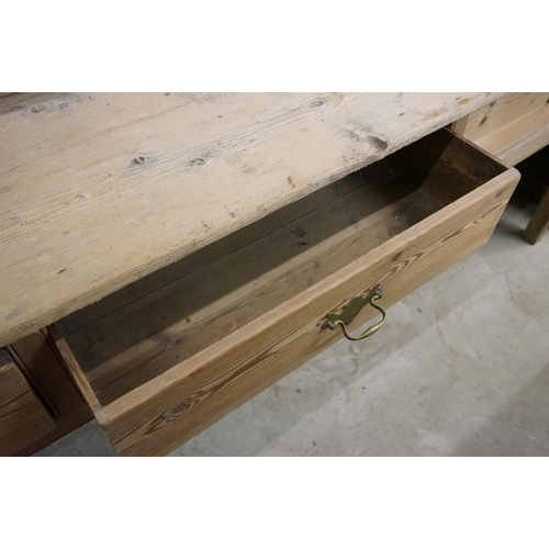 621 - 18th century Pine Dresser Base with three drawers raised on square legs, 243cm long x 52.5cm deep x ... 