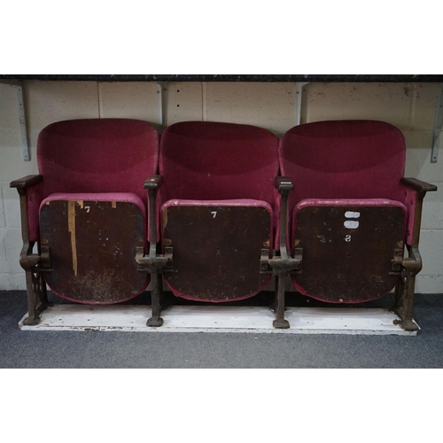 630 - Early 20th century Set of Three Interlocking Cinema Seats, pink upholstery, iron frame and wooden ar... 