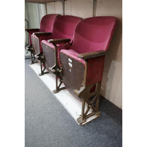 630 - Early 20th century Set of Three Interlocking Cinema Seats, pink upholstery, iron frame and wooden ar... 