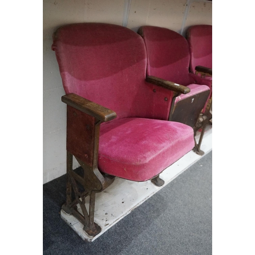 630 - Early 20th century Set of Three Interlocking Cinema Seats, pink upholstery, iron frame and wooden ar... 