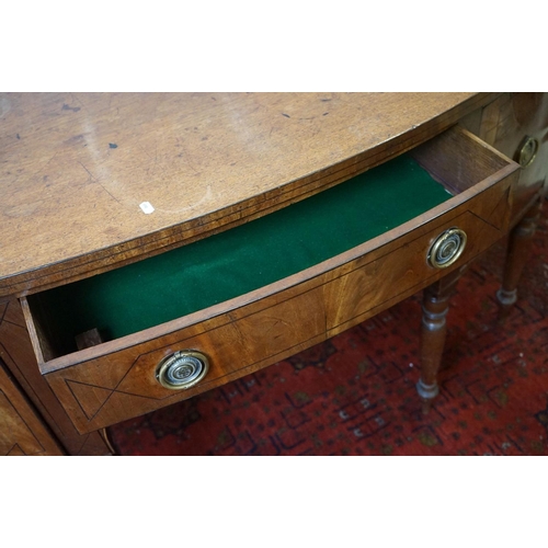 561 - 19th century Mahogany and Ebony strung Bow Fronted Sideboard with central drawer, deep drawer and cu... 