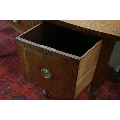 561 - 19th century Mahogany and Ebony strung Bow Fronted Sideboard with central drawer, deep drawer and cu... 