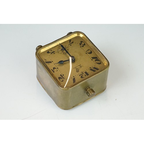 193 - A brass cased Art Deco French made travel alarm clock.