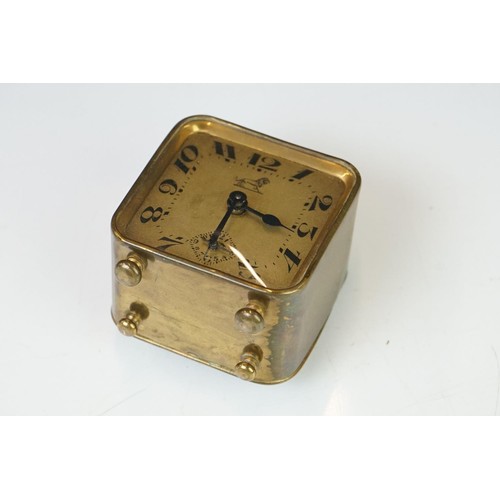 193 - A brass cased Art Deco French made travel alarm clock.