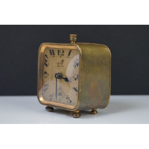 193 - A brass cased Art Deco French made travel alarm clock.