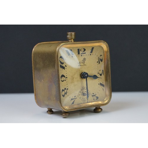 193 - A brass cased Art Deco French made travel alarm clock.