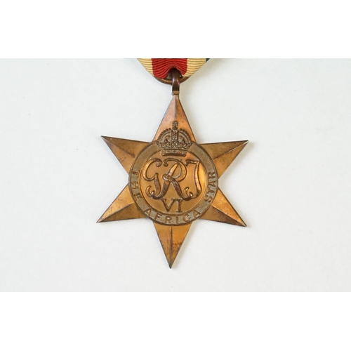 34 - A British Full Size World War Two Medal Group Of Four To Include The 1939-45 Star Medal, The Atlanti... 