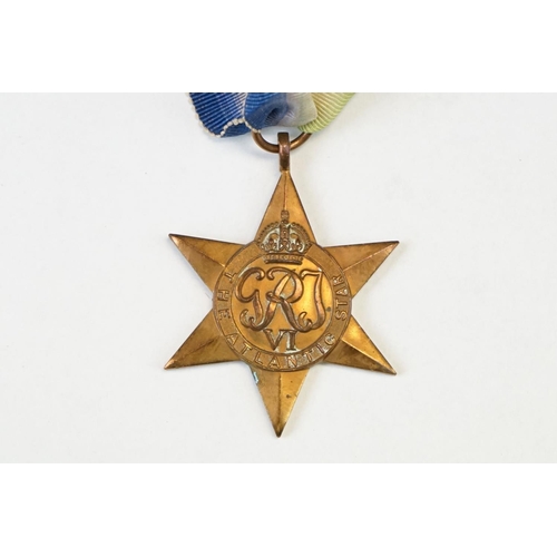 34 - A British Full Size World War Two Medal Group Of Four To Include The 1939-45 Star Medal, The Atlanti... 