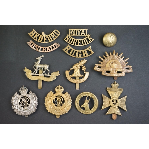 38 - A Small Collection Of British & Commonwealth Military Cap Badges, Buttons & Titles To Include The Ro... 