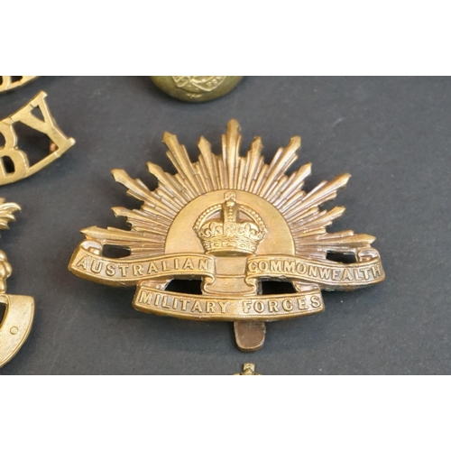 38 - A Small Collection Of British & Commonwealth Military Cap Badges, Buttons & Titles To Include The Ro... 