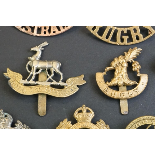 38 - A Small Collection Of British & Commonwealth Military Cap Badges, Buttons & Titles To Include The Ro... 