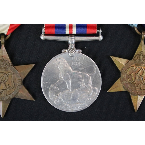 135 - A British World War Two Full Size Medal Group Of Three To Include The 1939-45 British War Medal, The... 