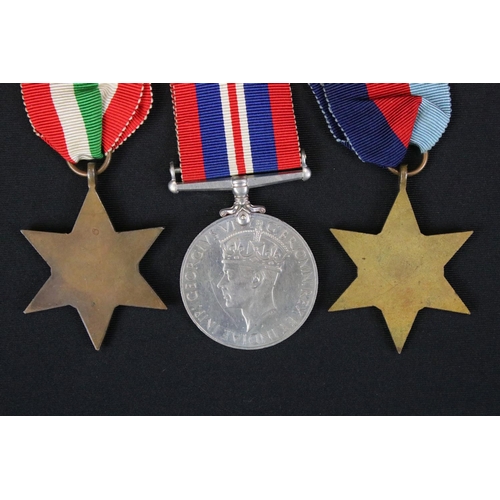 135 - A British World War Two Full Size Medal Group Of Three To Include The 1939-45 British War Medal, The... 