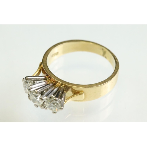 23 - Diamond three stone 18ct yellow and white gold set ring, three round brilliant cut diamonds, total d... 