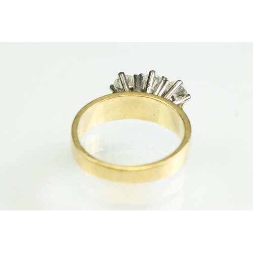 23 - Diamond three stone 18ct yellow and white gold set ring, three round brilliant cut diamonds, total d... 