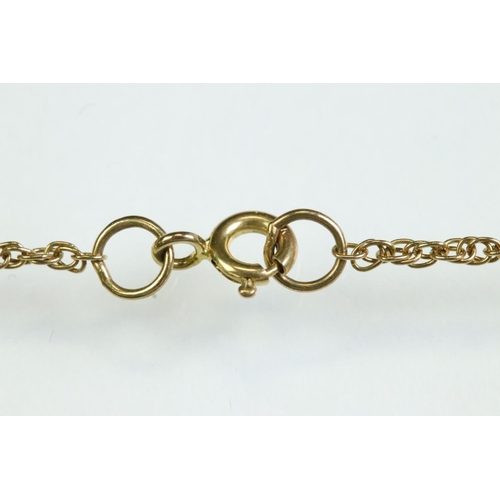27 - Half sovereign coin pendant necklace, Victoria dated 1899, 9ct gold mount and 9ct gold rope twist ch... 