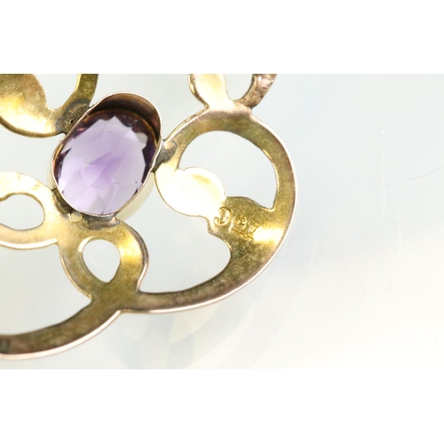 28 - Edwardian amethyst 9ct gold pendant necklace, the oval mixed cut amethyst measuring approx 7mm x 5mm... 