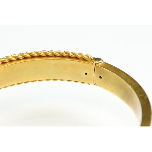 11 - Victorian Etruscan revival 15ct yellow gold hinged bangle, rope twist and granulation detailing, wid... 