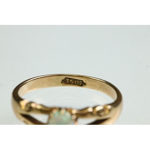 13 - Victorian opal 15ct yellow gold ring, the oval cabochon cut precious white opal displaying yellow, g... 