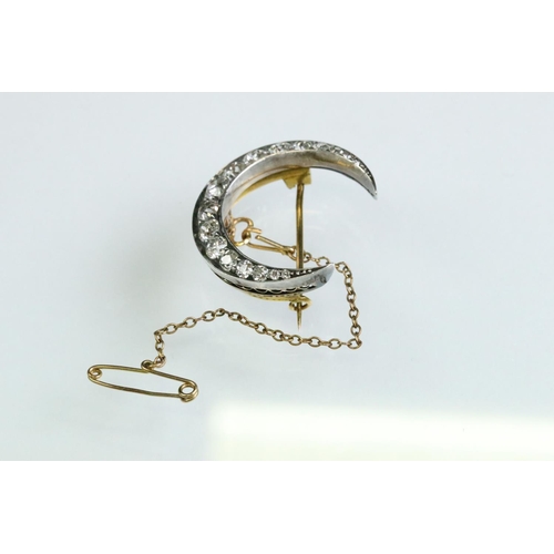 16 - 19th century diamond unmarked yellow and rose gold silver set crescent brooch, seventeen graduated a... 