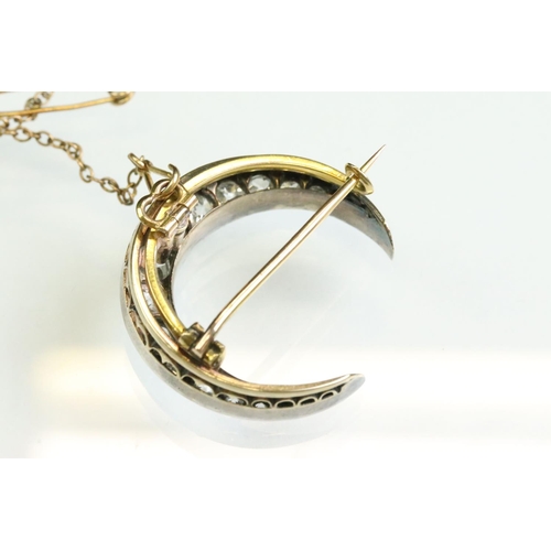 16 - 19th century diamond unmarked yellow and rose gold silver set crescent brooch, seventeen graduated a... 
