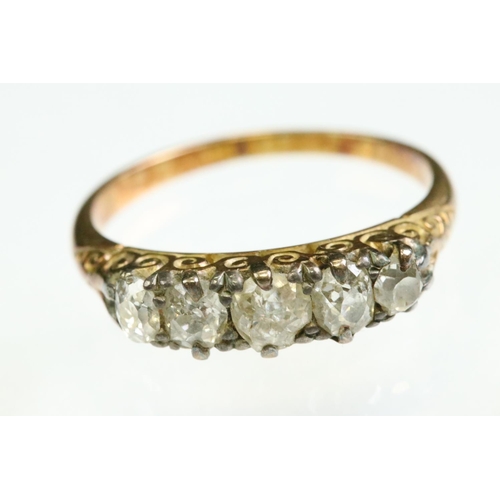 32 - Victorian diamond unmarked yellow gold five stone ring, five graduated old cushion cut diamonds, sil... 