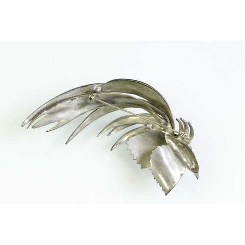 34 - Marcasite white metal exotic bird brooch, the body, wings and tail feathers set with rose cut diamon... 