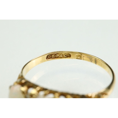 38 - Opal and diamond yellow gold ring, three graduated oval cabochon cut precious white opals, displayin... 
