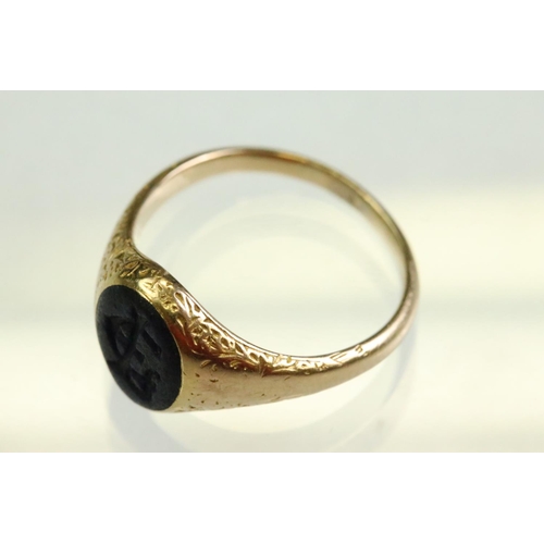 46 - Mid 19th century lapis lazuli unmarked yellow gold signet ring, the oval lapis lazuli panel measurin... 