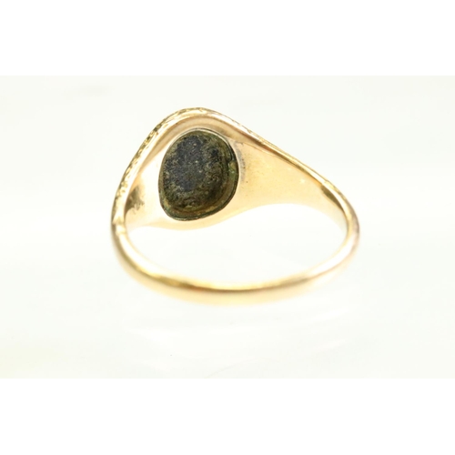 46 - Mid 19th century lapis lazuli unmarked yellow gold signet ring, the oval lapis lazuli panel measurin... 