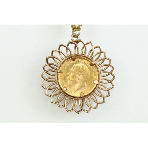 47 - Full sovereign coin pendant necklace, George V dated 1915, 9ct gold mount, 9ct yellow gold flat curb... 